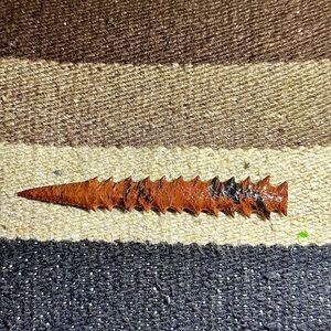 Knapped Hohokam point, obsidian.